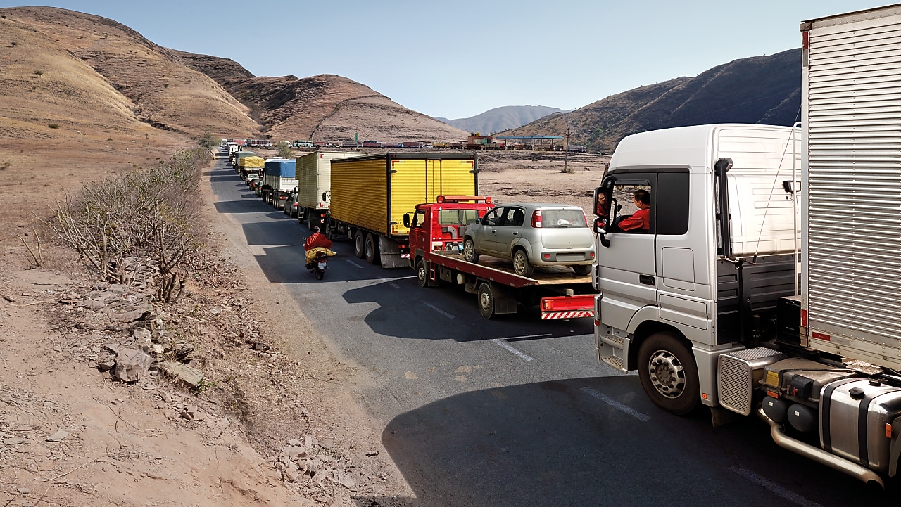 truck driver driving on empty road