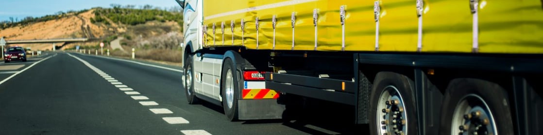 Yellow truck on the road