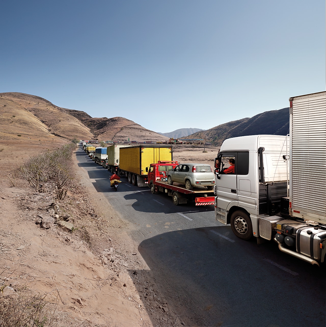 truck driver driving on empty road