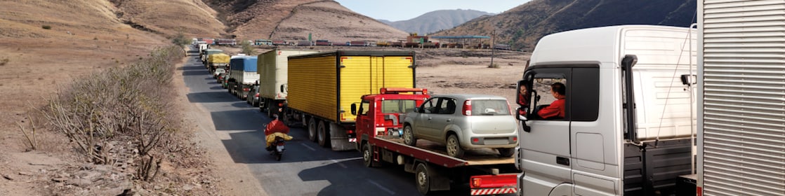 truck driver driving on empty road