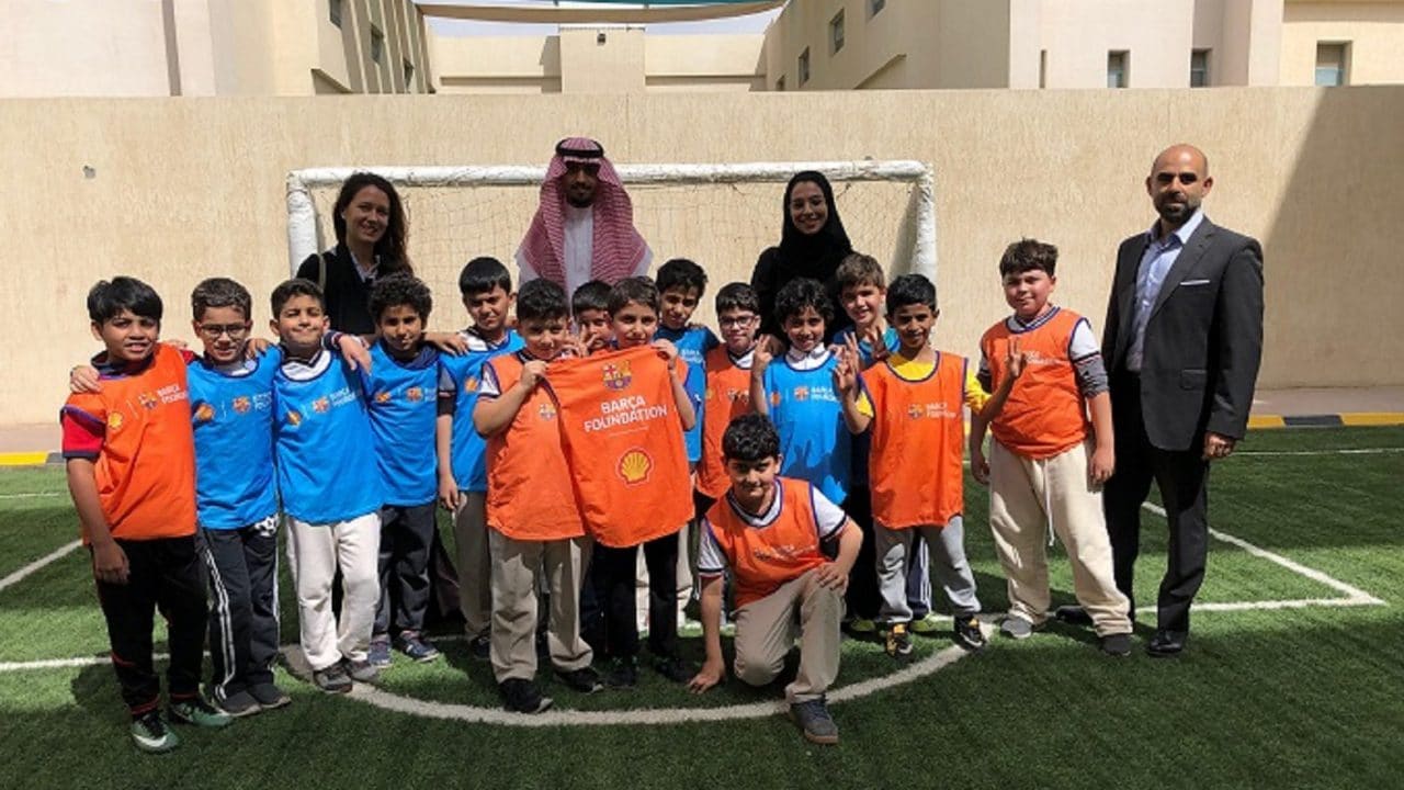Children playing football at a futbolnet event in Saudi Arabia