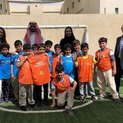 Children playing football at a futbolnet event in Saudi Arabia