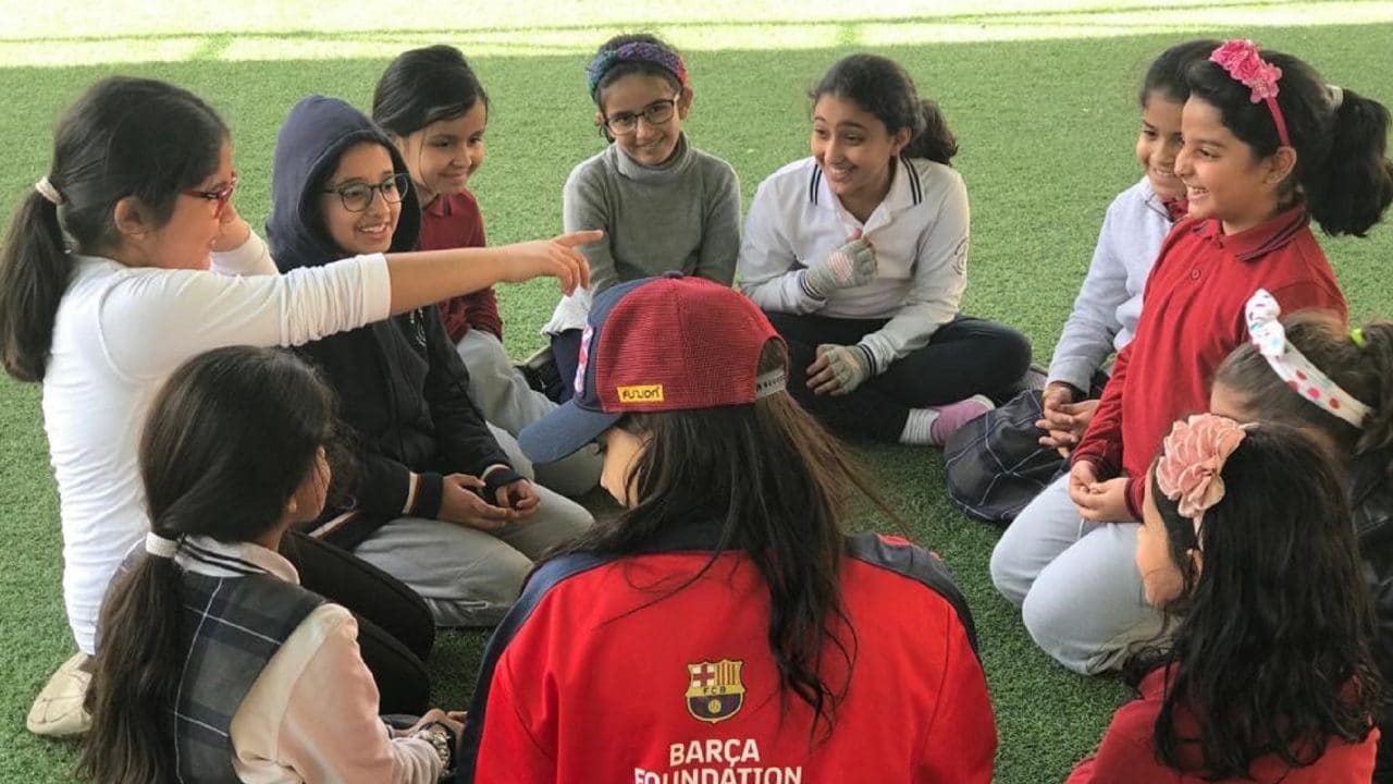 Children playing football at a futbolnet event in Saudi Arabia
