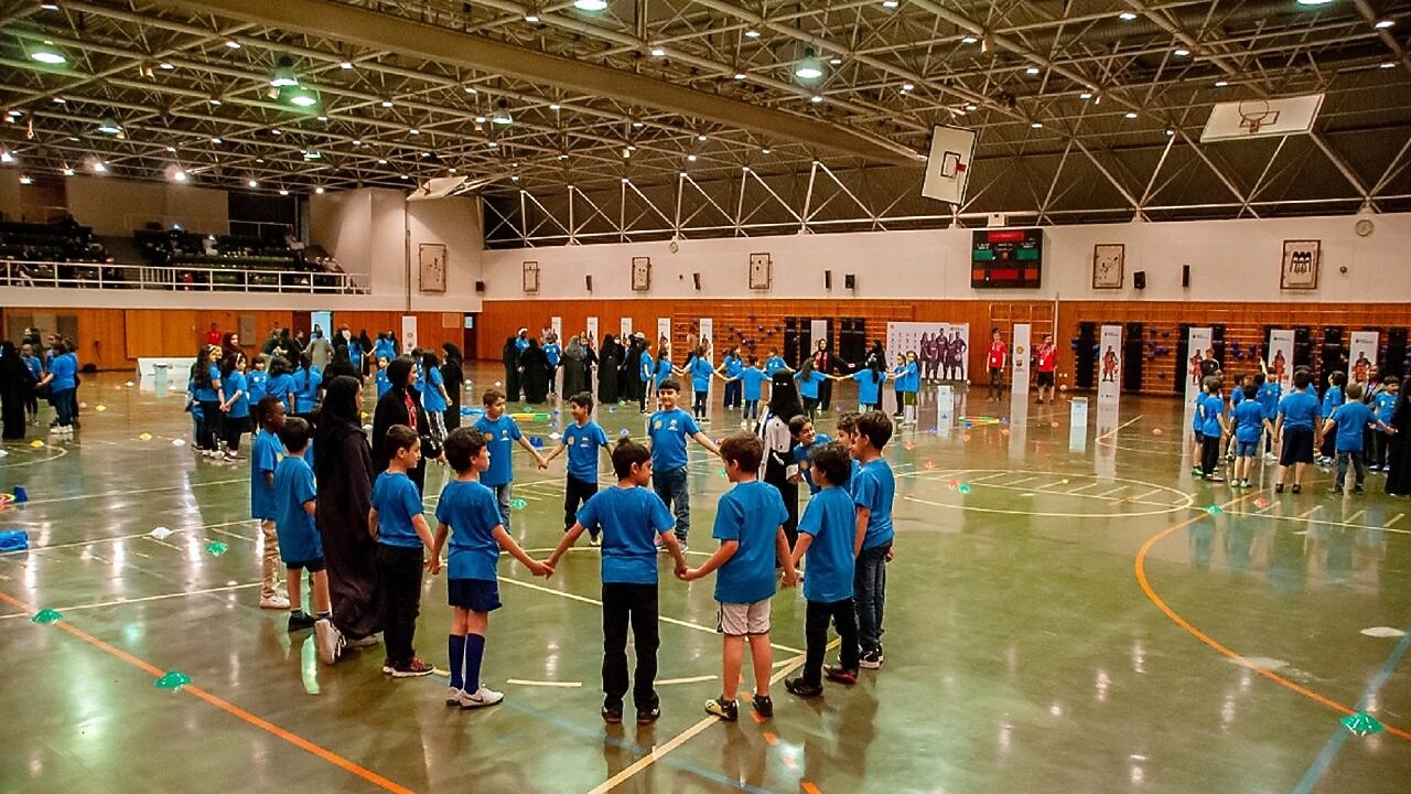 Children playing football at a futbolnet event in Saudi Arabia