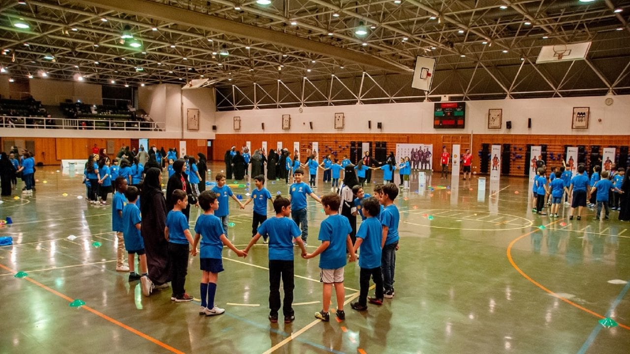 Children playing football at a futbolnet event in Saudi Arabia