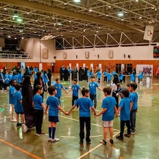 Children playing football at a futbolnet event in Saudi Arabia