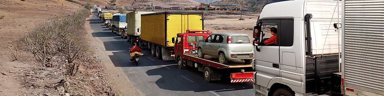 truck driver driving on empty road