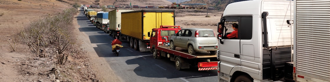 truck driver driving on empty road