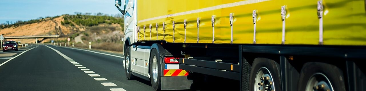 Yellow truck on the road