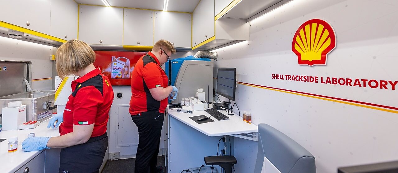 Two people working on desk