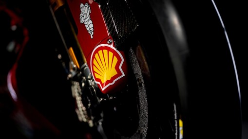 Motorcycle fork with Shell and Michelin stickers