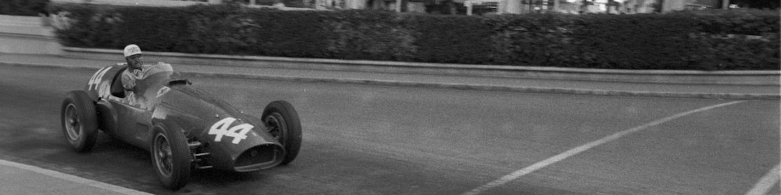 Maurice Trintignant driving his Ferrari Formula 1 car at the Monaco Grand Prix in 1955