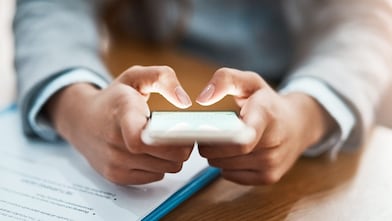 Closeup shot of an person using a cellphone