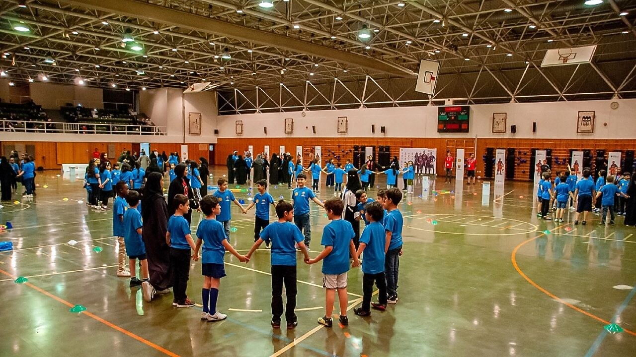 Children playing football at a futbolnet event in Saudi Arabia