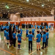 Children playing football at a futbolnet event in Saudi Arabia