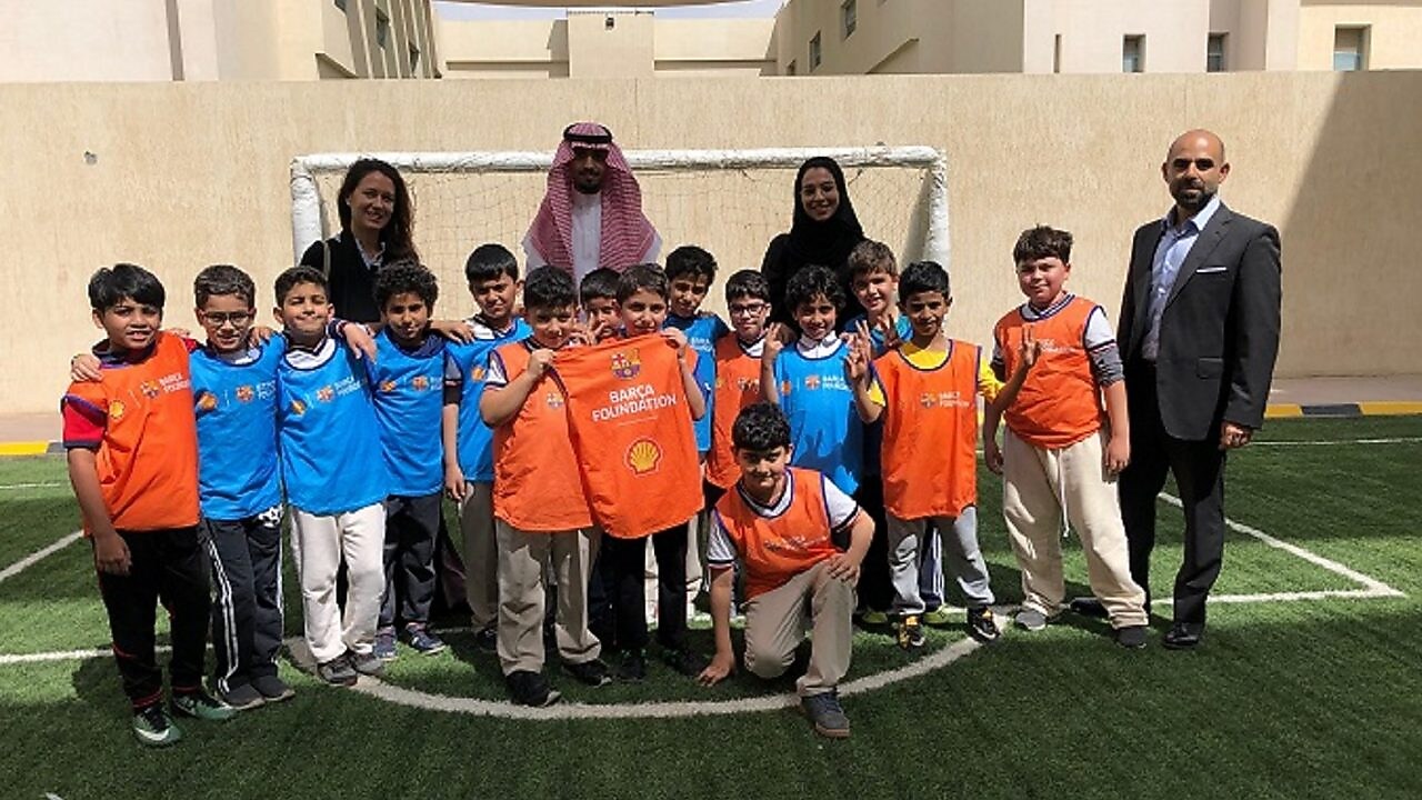 Children playing football at a futbolnet event in Saudi Arabia